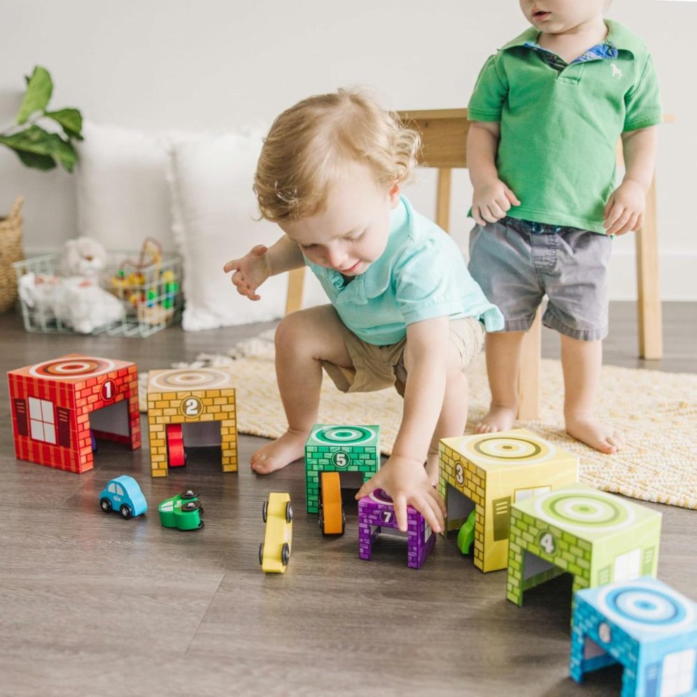 Nesting And Sorting Garages And Cars With 7 Graduated Garages And 7 Stackable Wooden Cars – Fsc Certified  |  Sorting & Stacking Toys All Toys Sorting & Stacking Toys