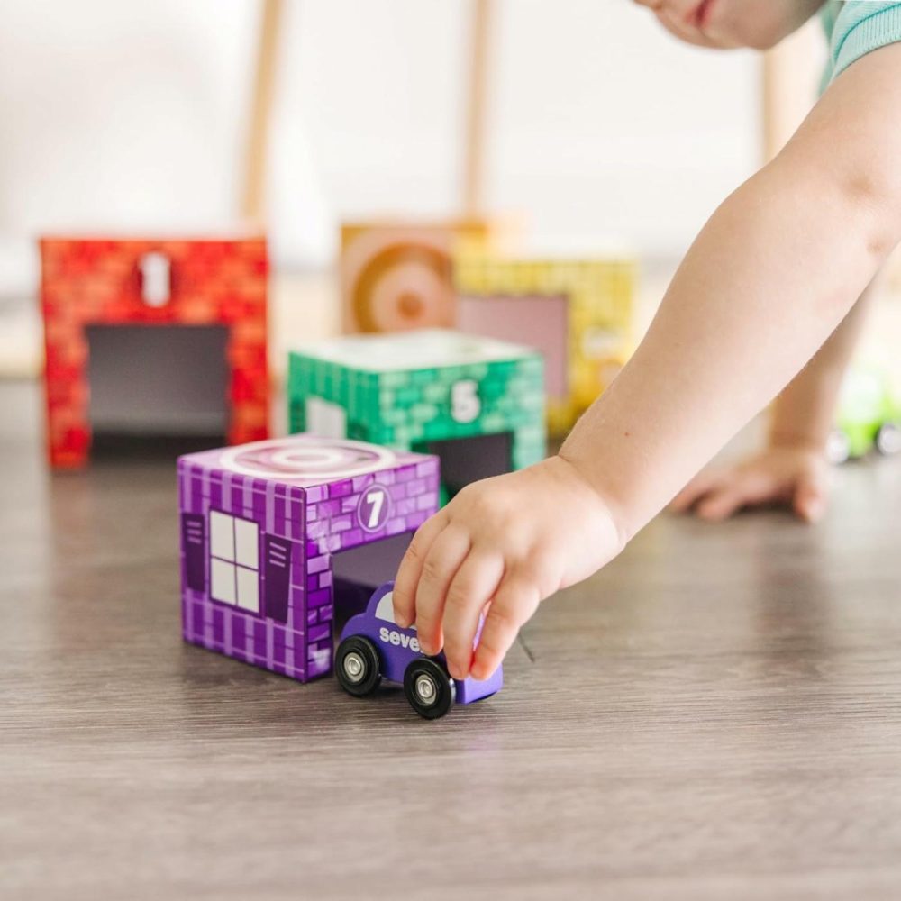 Nesting And Sorting Garages And Cars With 7 Graduated Garages And 7 Stackable Wooden Cars – Fsc Certified  |  Sorting & Stacking Toys All Toys Sorting & Stacking Toys