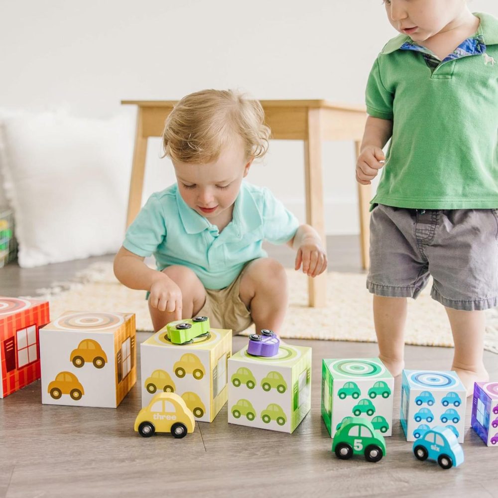 Nesting And Sorting Garages And Cars With 7 Graduated Garages And 7 Stackable Wooden Cars – Fsc Certified  |  Sorting & Stacking Toys All Toys Sorting & Stacking Toys